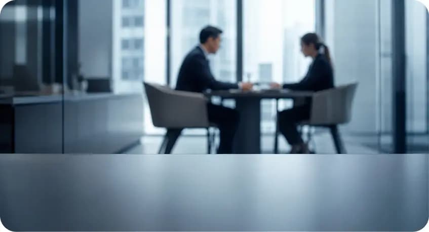 Banker meeting a client in a high-rise office