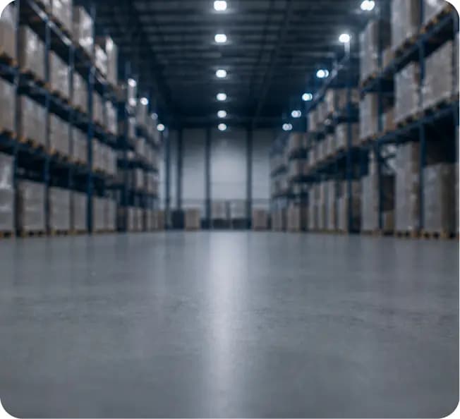 Warehouse aisle with tall shelves